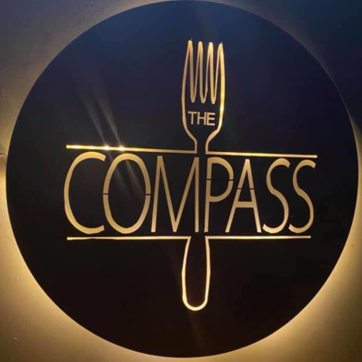 The Compass Wood-Fired Kitchen Logo in McAlester, Oklahoma